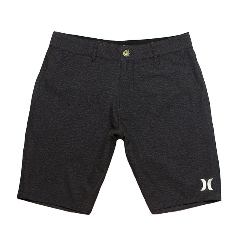 Shorts de plage pour homme Hurley, coupe courte, séchage rapide, déperlants, stretch, style décontracté pour surf et détente.