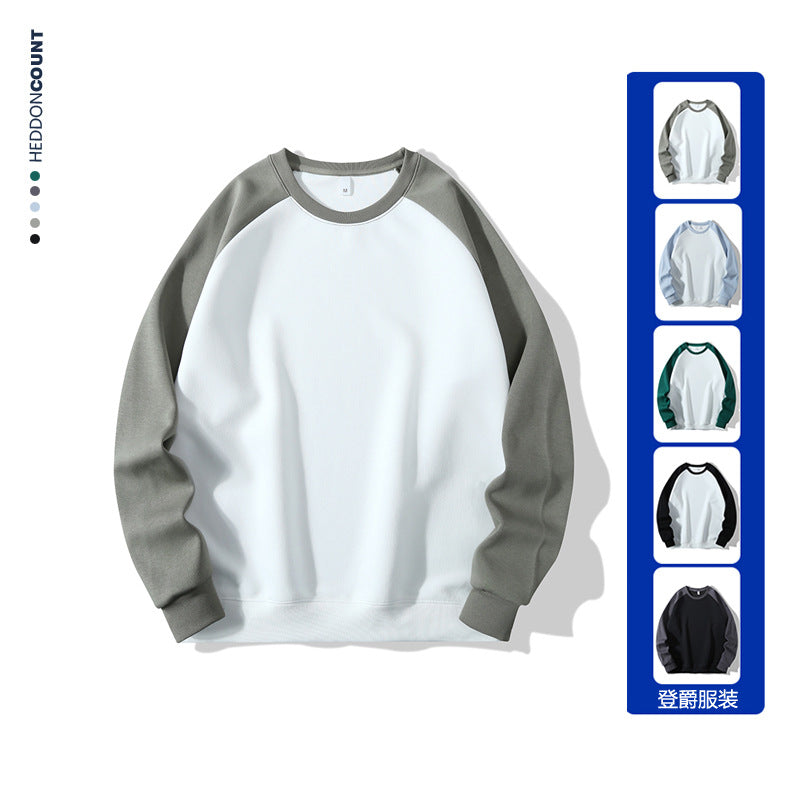 Sweat à manches longues homme en tissu épais, coupe droite, color-blocking tendance, manches raglan, col rond, confortable et unisexe.
