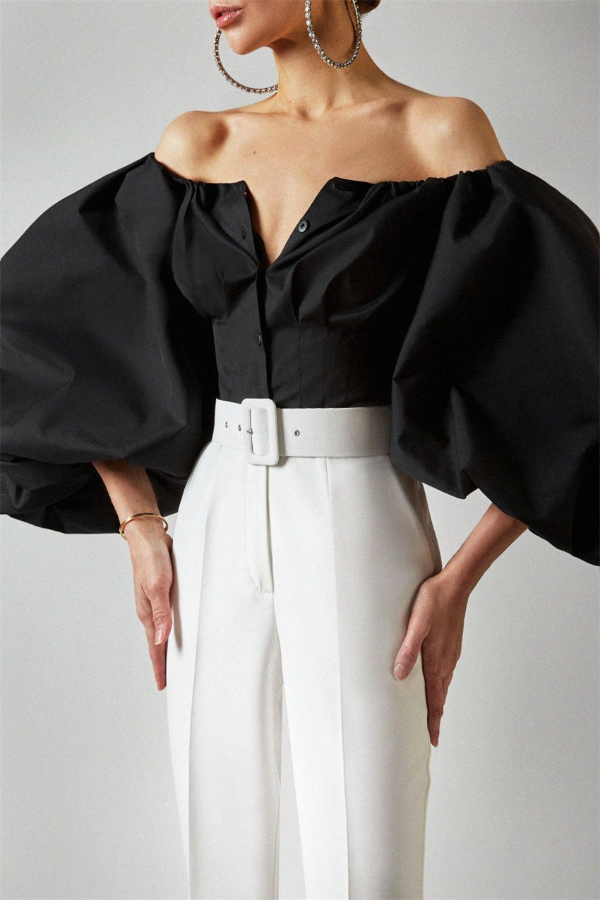 Cross-border 2022 spring and summer new design sense long sleeve bubble balloon sleeve leaky shoulder European and American women's shirt top top