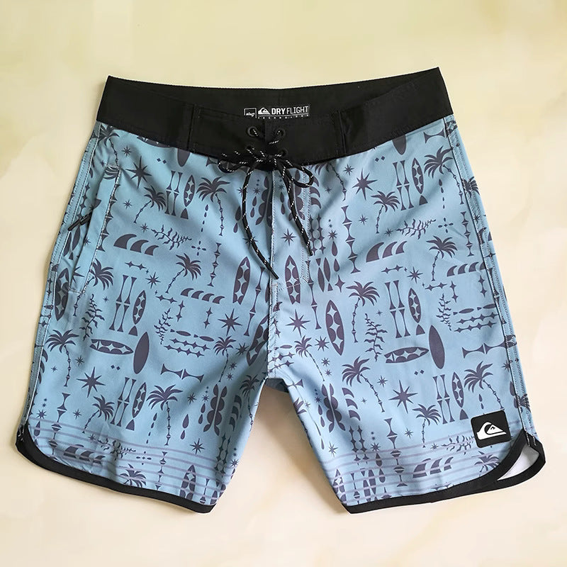 Shorts de plage Quiksilver pour homme, séchage rapide, lavable, grande taille, coupe ample et courte, style détente en station balnéaire.