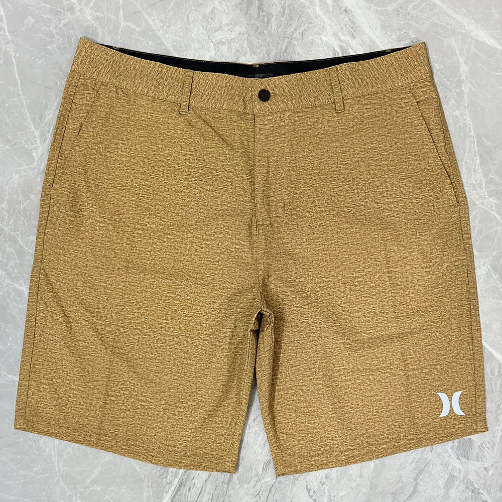 Shorts de plage pour homme Hurley, coupe courte, séchage rapide, déperlants, stretch, style décontracté pour surf et détente.