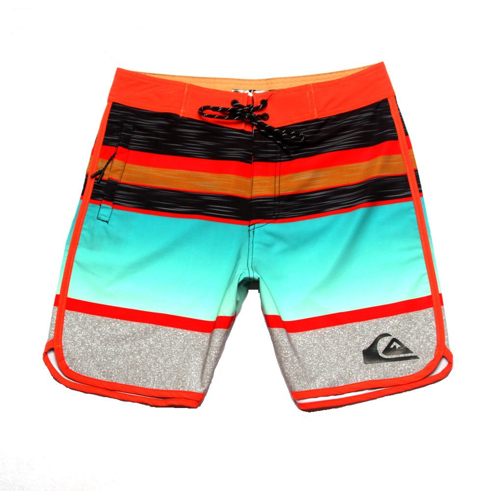 Shorts de plage Quiksilver pour homme, séchage rapide, lavable, grande taille, coupe ample et courte, style détente en station balnéaire.