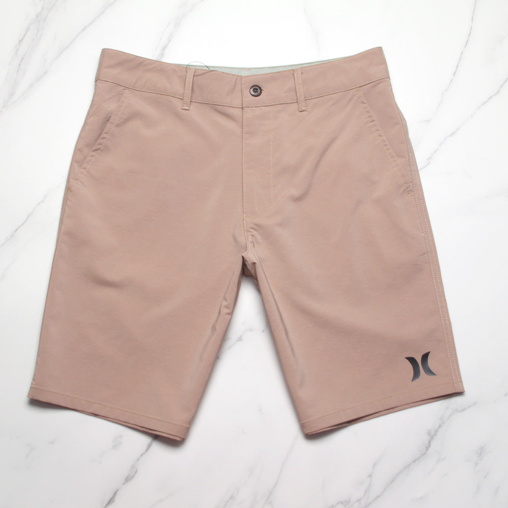 Shorts de plage pour homme Hurley, coupe courte, séchage rapide, déperlants, stretch, style décontracté pour surf et détente.