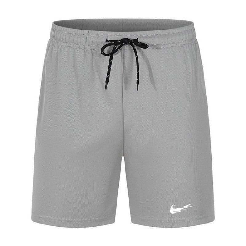 Short de plage pour homme, taille mi-haute avec cordon, tissu à séchage rapide en mesh, grande taille, style décontracté et polyvalent pour l’été.