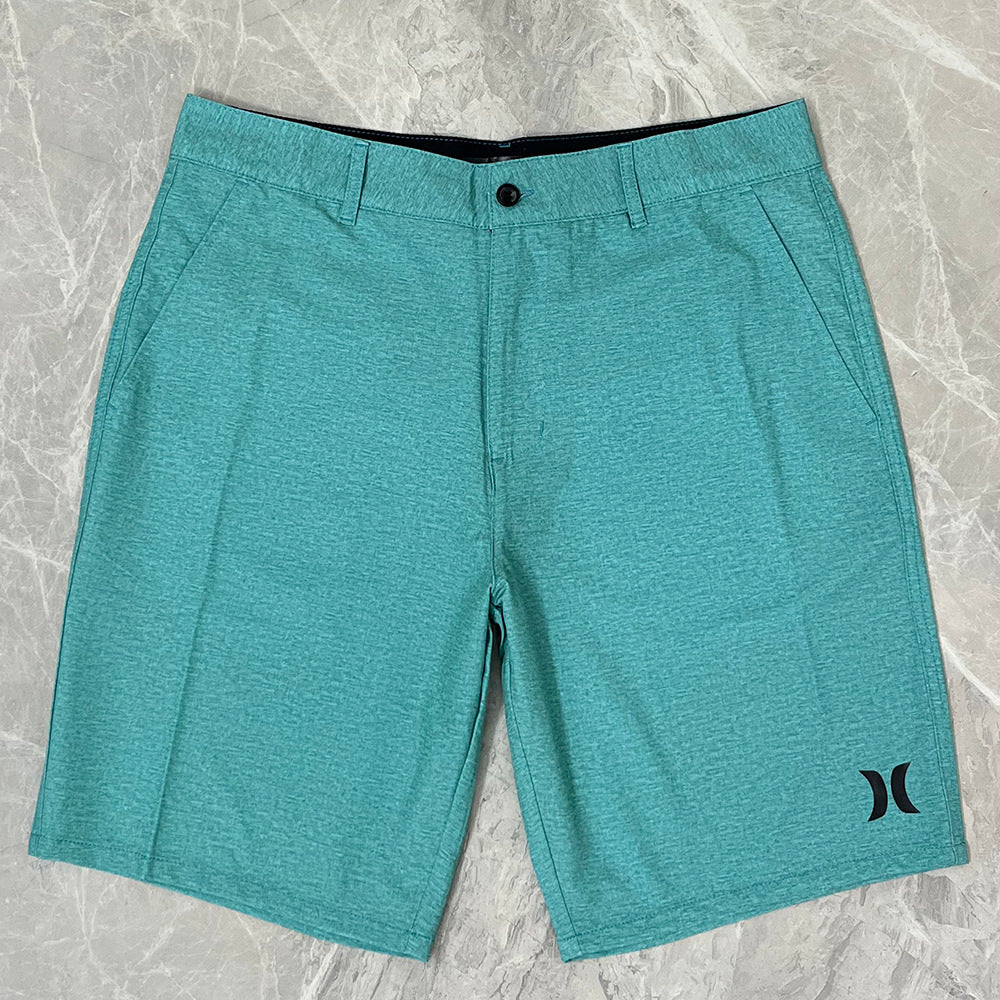 Shorts de plage pour homme Hurley, coupe courte, séchage rapide, déperlants, stretch, style décontracté pour surf et détente.