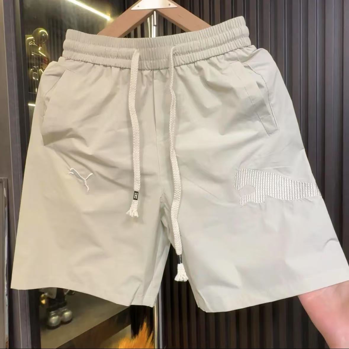 Shorts d'été en matière fine, séchage rapide, anti-frottement, tendance mode décontractée, polyvalents et disponibles en plusieurs couleurs.