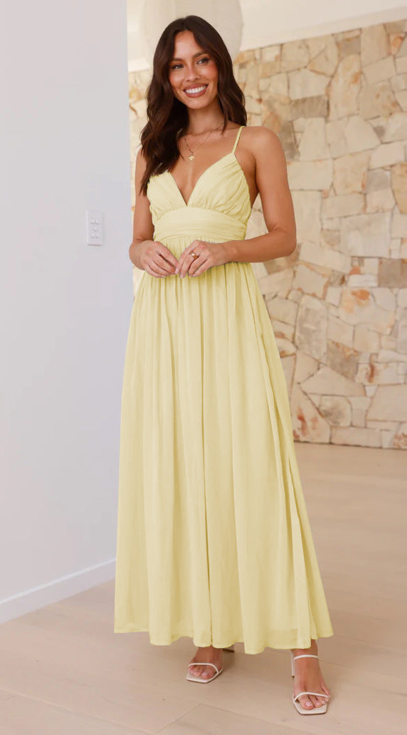 Robe d'été pour femme, style européen et américain, dos nu à fines bretelles, taille cintrée, en chiffon léger, coupe fluide et élégante.