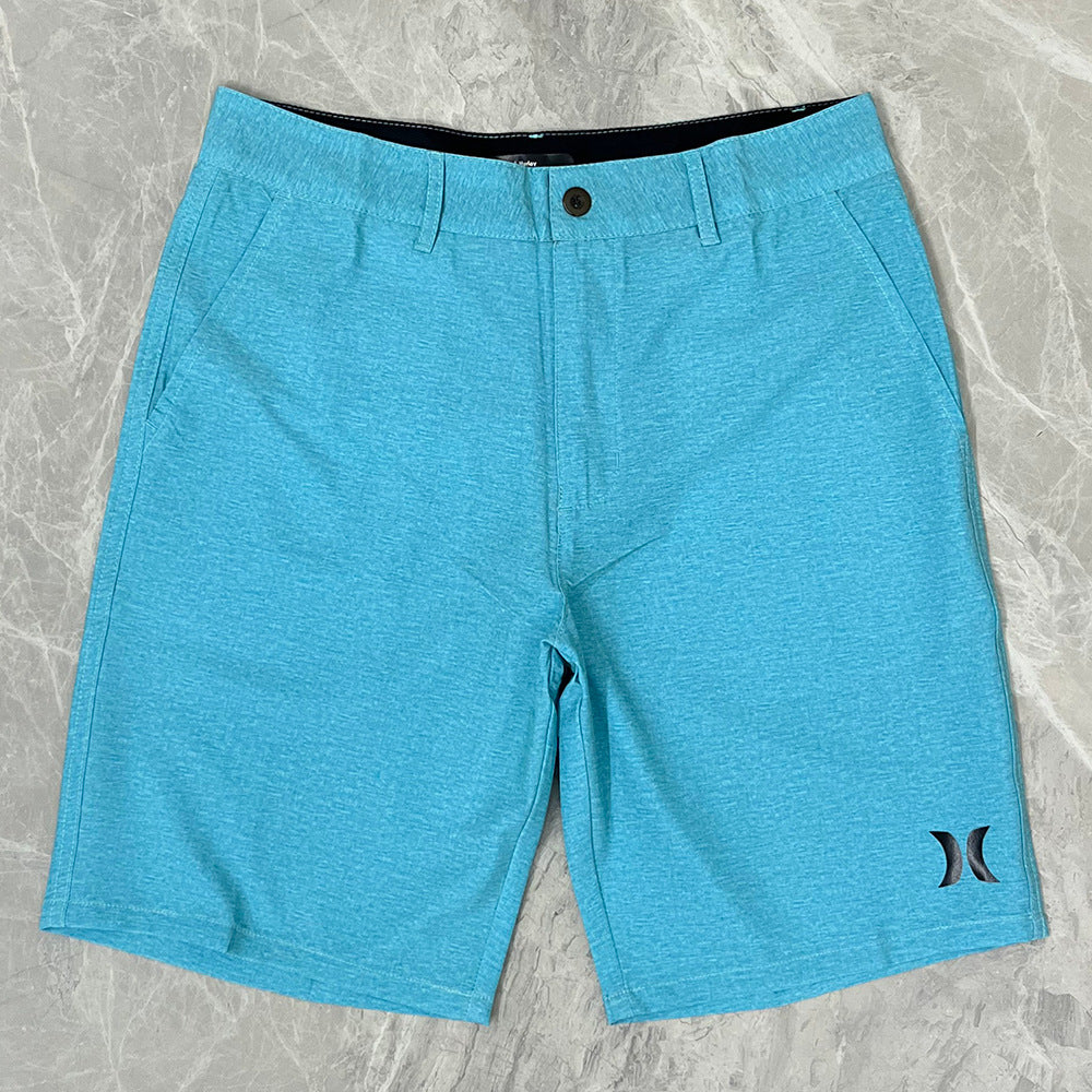 Shorts de plage pour homme Hurley, coupe courte, séchage rapide, déperlants, stretch, style décontracté pour surf et détente.