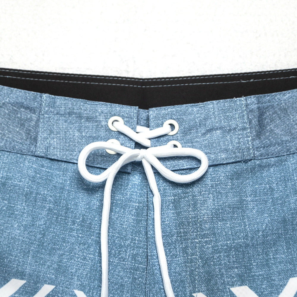 Shorts de plage Quiksilver pour homme, séchage rapide, lavable, grande taille, coupe ample et courte, style détente en station balnéaire.