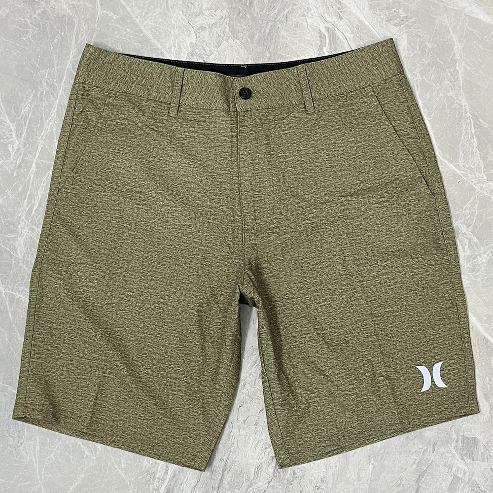 Shorts de plage pour homme Hurley, coupe courte, séchage rapide, déperlants, stretch, style décontracté pour surf et détente.
