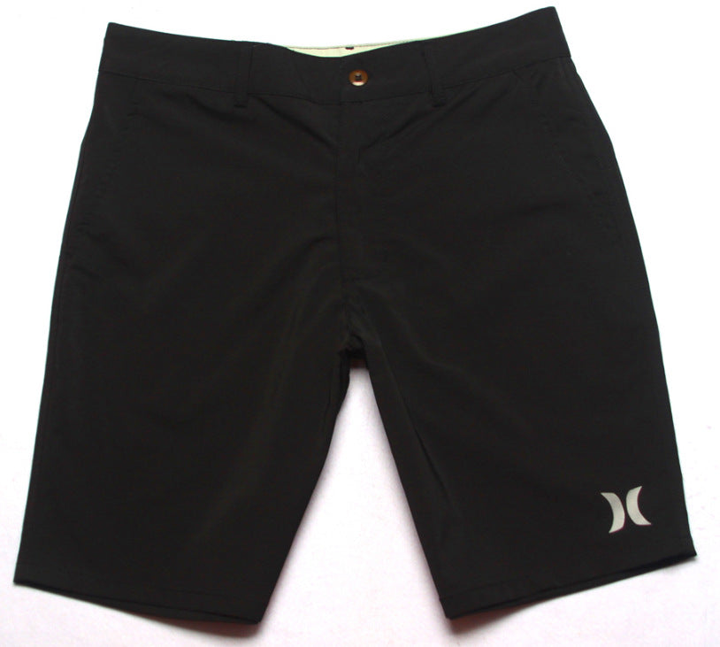 Shorts de plage pour homme Hurley, coupe courte, séchage rapide, déperlants, stretch, style décontracté pour surf et détente.