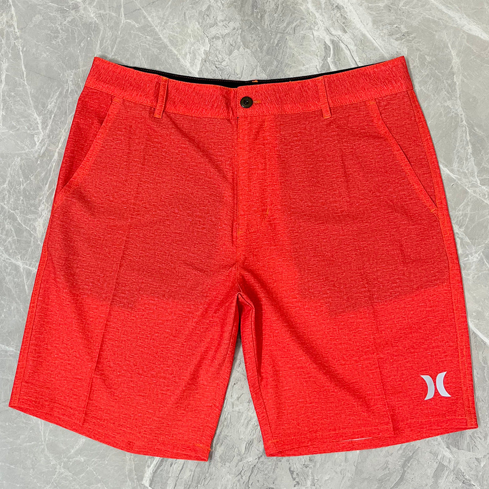 Shorts de plage pour homme Hurley, coupe courte, séchage rapide, déperlants, stretch, style décontracté pour surf et détente.