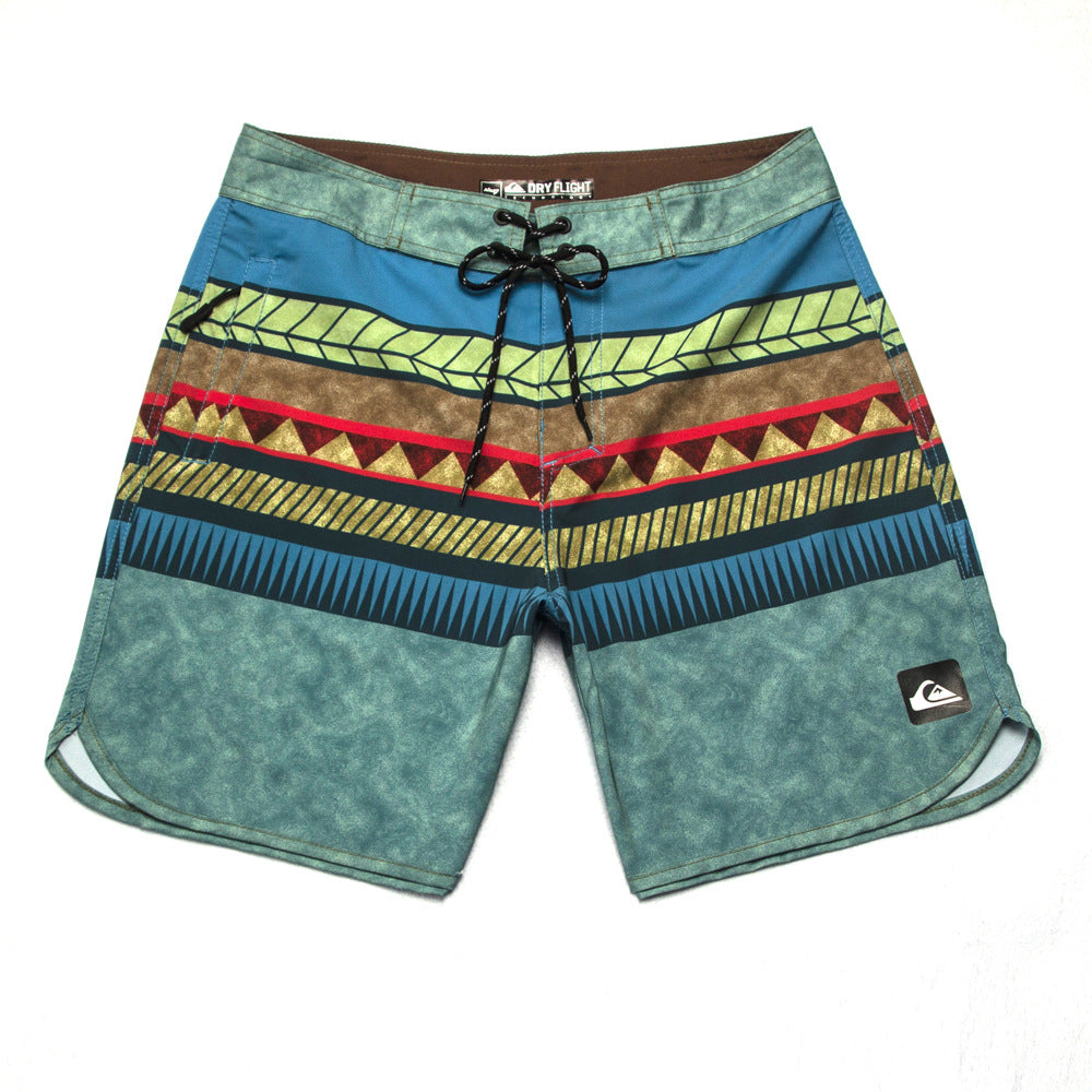 Shorts de plage Quiksilver pour homme, séchage rapide, lavable, grande taille, coupe ample et courte, style détente en station balnéaire.