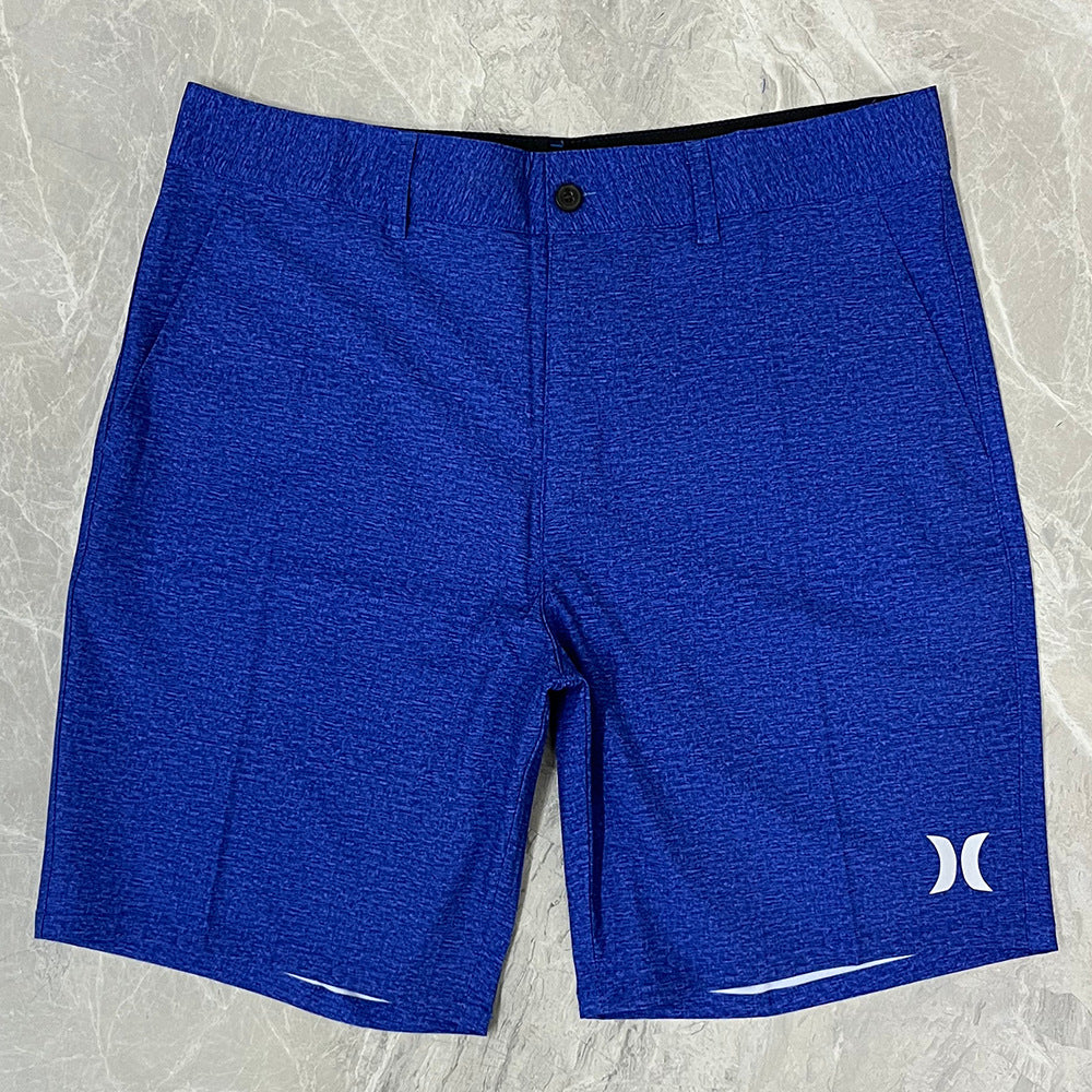 Shorts de plage pour homme Hurley, coupe courte, séchage rapide, déperlants, stretch, style décontracté pour surf et détente.