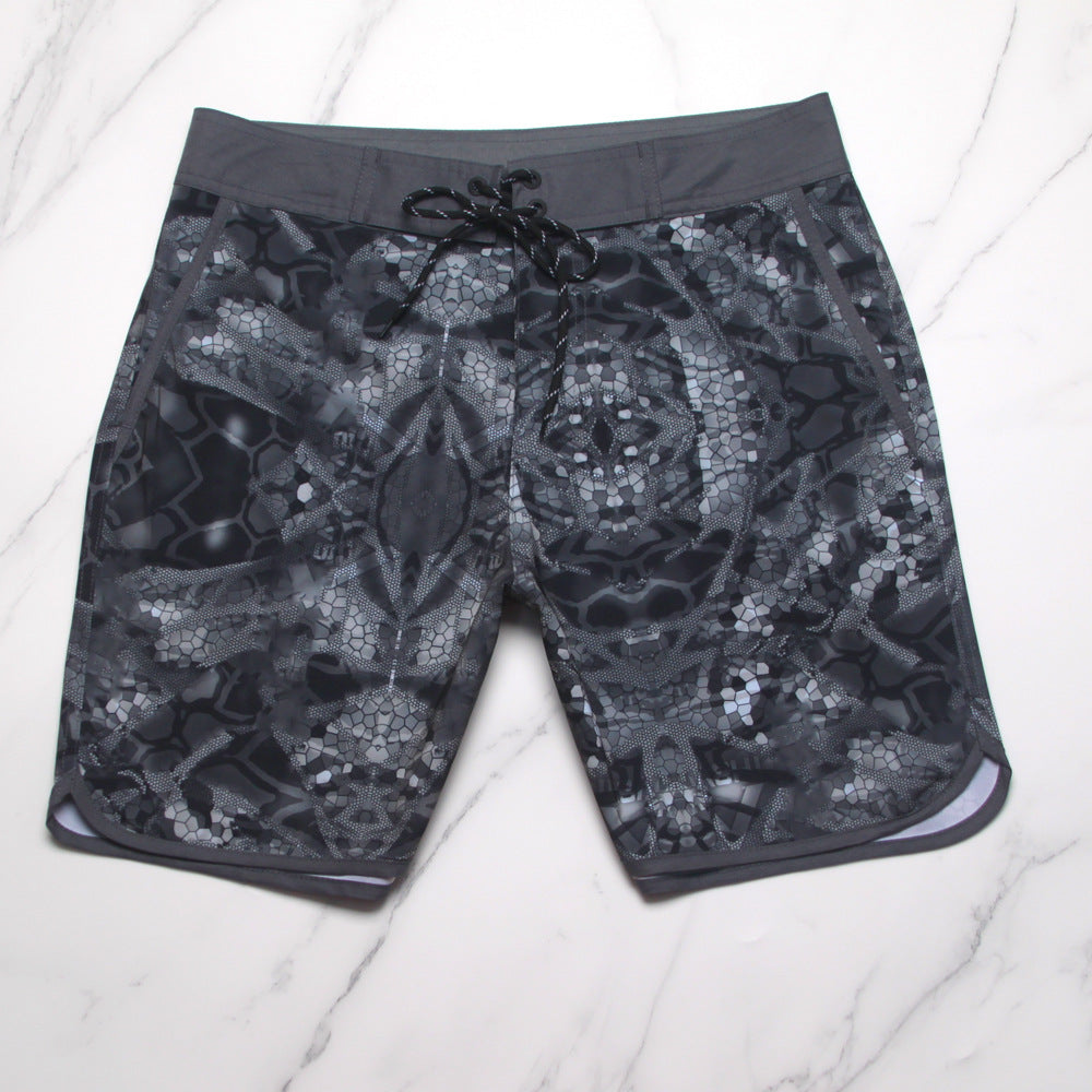 Shorts de plage Quiksilver pour homme, séchage rapide, lavable, grande taille, coupe ample et courte, style détente en station balnéaire.