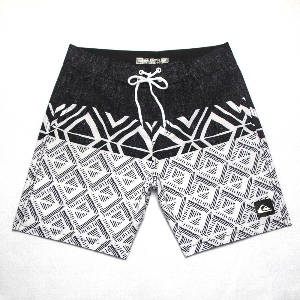 Shorts de plage Quiksilver pour homme, séchage rapide, lavable, grande taille, coupe ample et courte, style détente en station balnéaire.