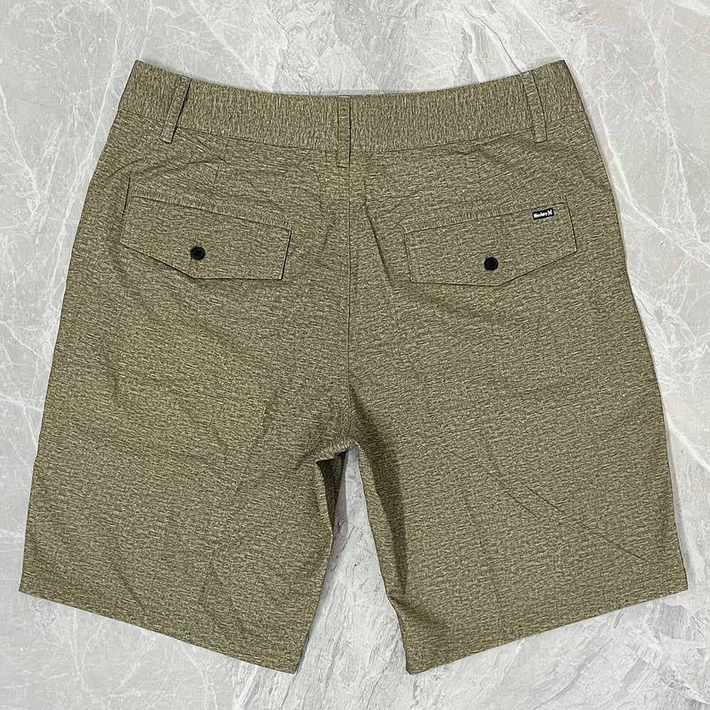 Shorts de plage pour homme Hurley, coupe courte, séchage rapide, déperlants, stretch, style décontracté pour surf et détente.