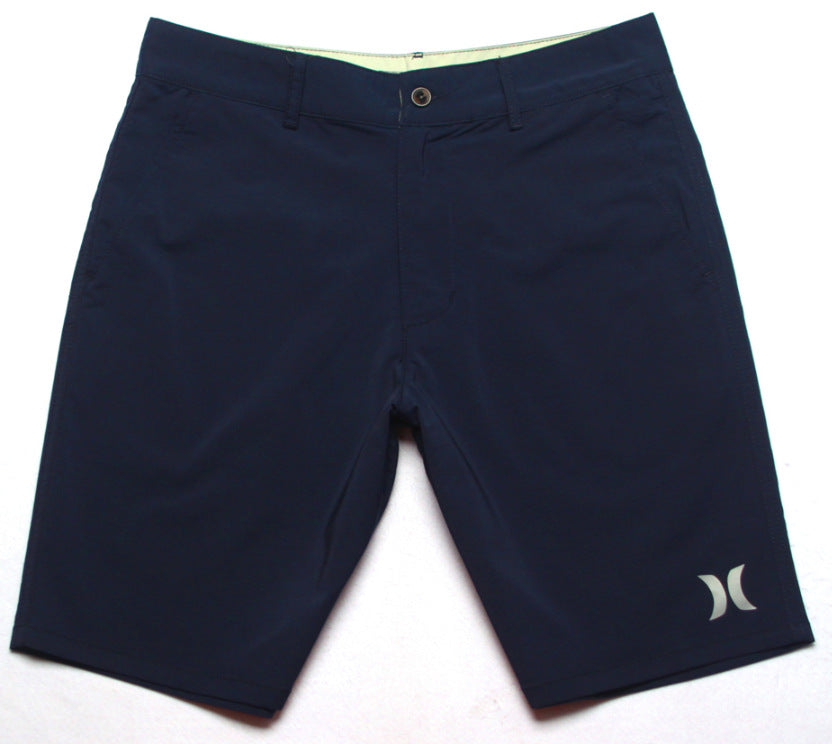 Shorts de plage pour homme Hurley, coupe courte, séchage rapide, déperlants, stretch, style décontracté pour surf et détente.