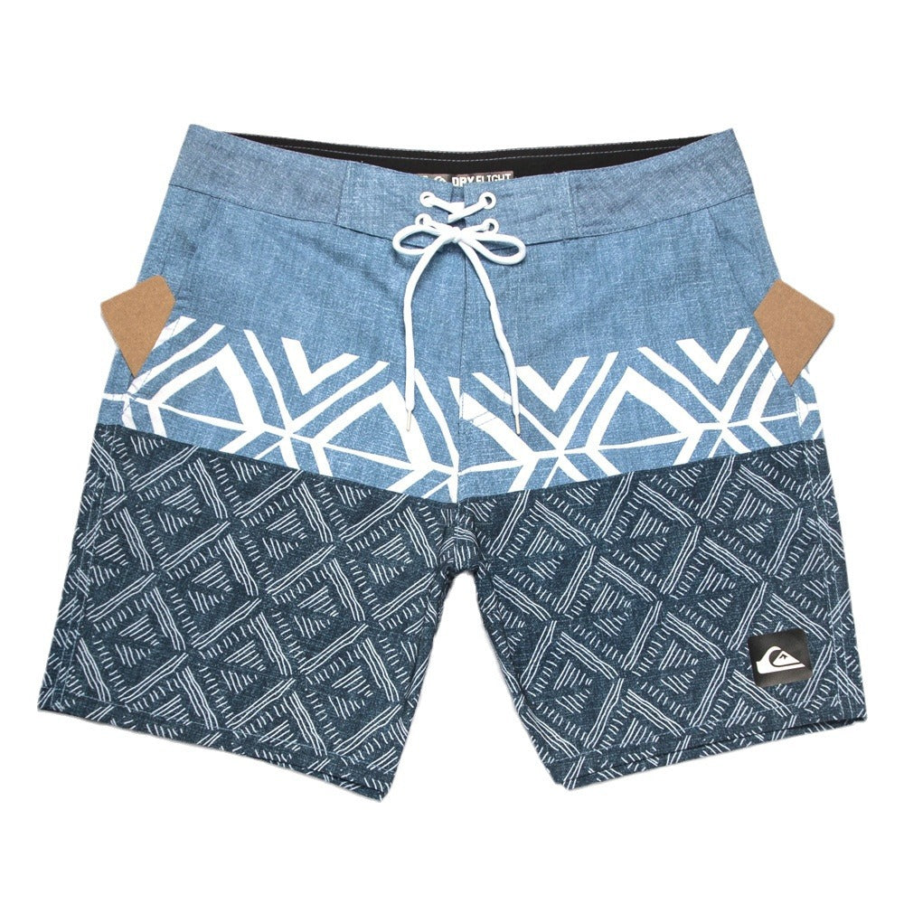 Shorts de plage Quiksilver pour homme, séchage rapide, lavable, grande taille, coupe ample et courte, style détente en station balnéaire.