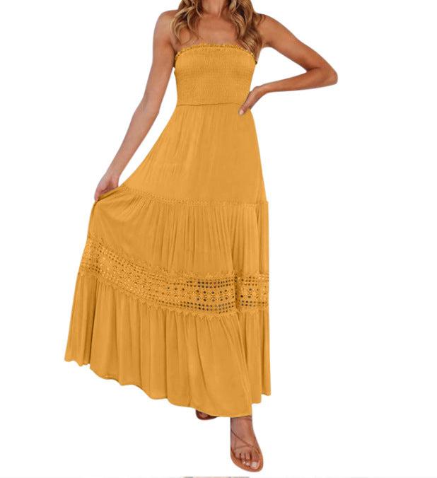 Robe longue sans manches, style bohème vintage, couleur unie, haut bandeau, taille cintrée et coupe élégante.