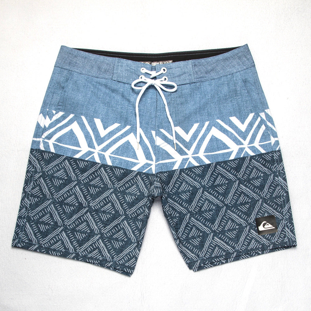 Shorts de plage Quiksilver pour homme, séchage rapide, lavable, grande taille, coupe ample et courte, style détente en station balnéaire.