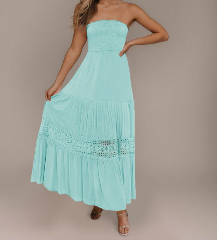 Robe longue sans manches, style bohème vintage, couleur unie, haut bandeau, taille cintrée et coupe élégante.
