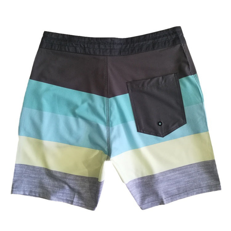 Pantalon de fitness Quiksilver pour homme, adapté au bodybuilding et compétitions, déperlant, séchage rapide, stretch, parfait pour le surf et la plage.