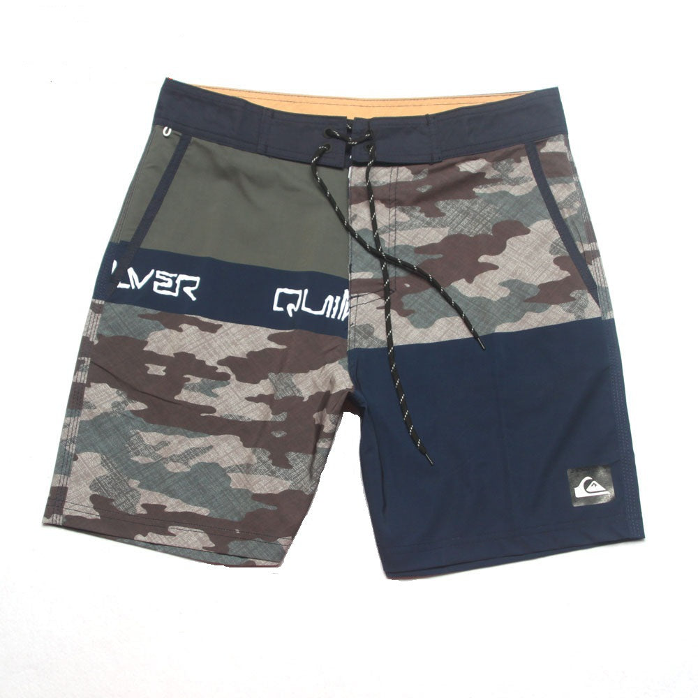Pantalon de fitness Quiksilver pour homme, adapté au bodybuilding et compétitions, déperlant, séchage rapide, stretch, parfait pour le surf et la plage.