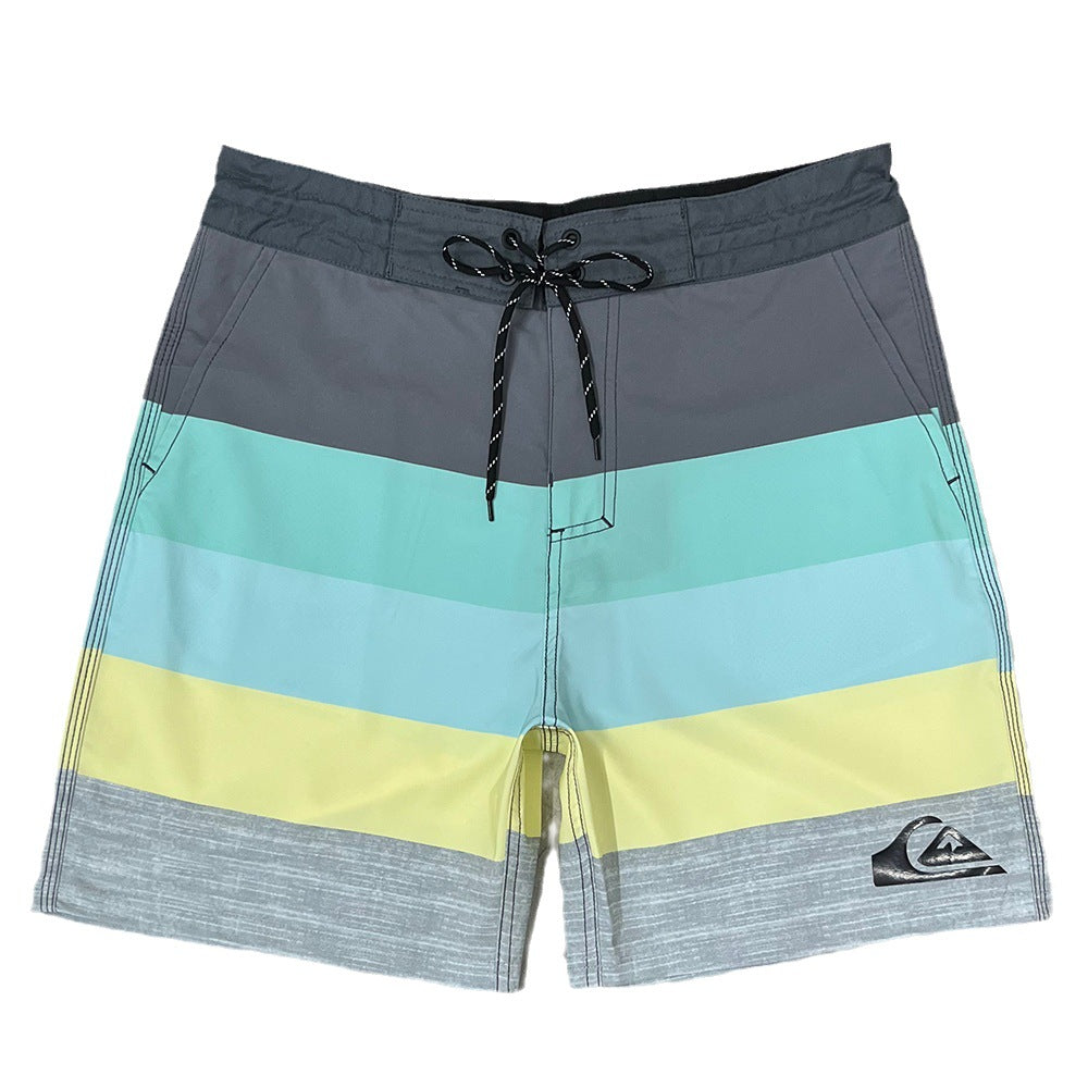 Pantalon de fitness Quiksilver pour homme, adapté au bodybuilding et compétitions, déperlant, séchage rapide, stretch, parfait pour le surf et la plage.
