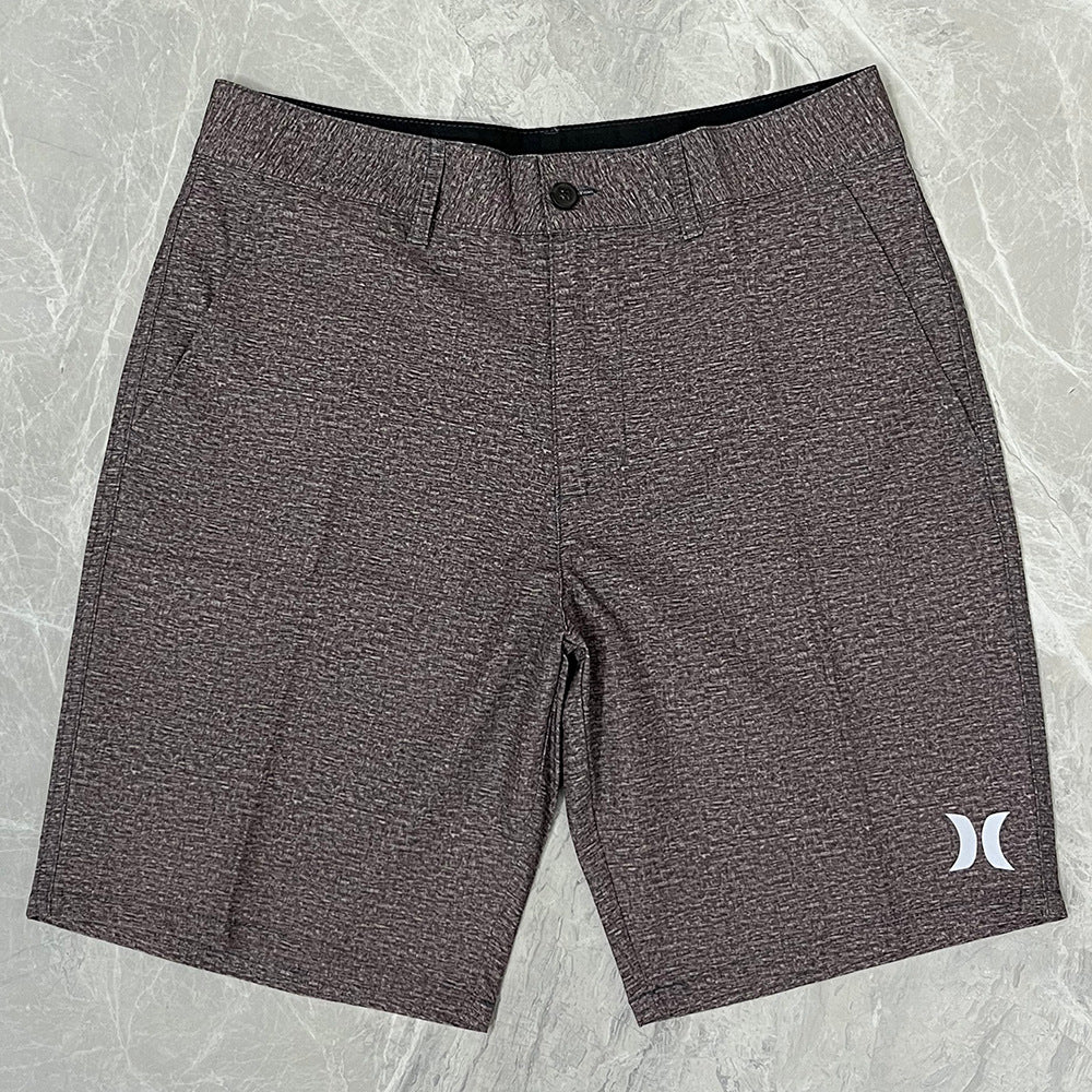 Shorts de plage pour homme Hurley, coupe courte, séchage rapide, déperlants, stretch, style décontracté pour surf et détente.