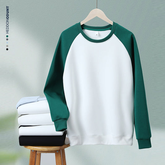 Sweat à manches longues homme en tissu épais, coupe droite, color-blocking tendance, manches raglan, col rond, confortable et unisexe.