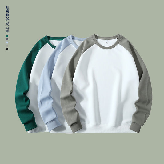 Sweat à manches longues homme en tissu épais, coupe droite, color-blocking tendance, manches raglan, col rond, confortable et unisexe.
