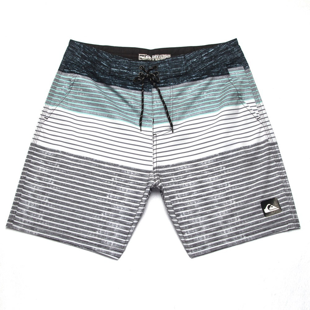 Pantalon de fitness Quiksilver pour homme, adapté au bodybuilding et compétitions, déperlant, séchage rapide, stretch, parfait pour le surf et la plage.