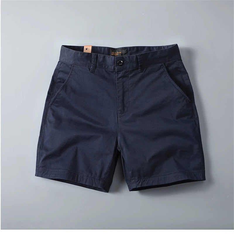 Short cargo homme en coton stretch, style casual américain, coupe droite et ajustée, tendance estivale, coloris kaki à quatre poches.