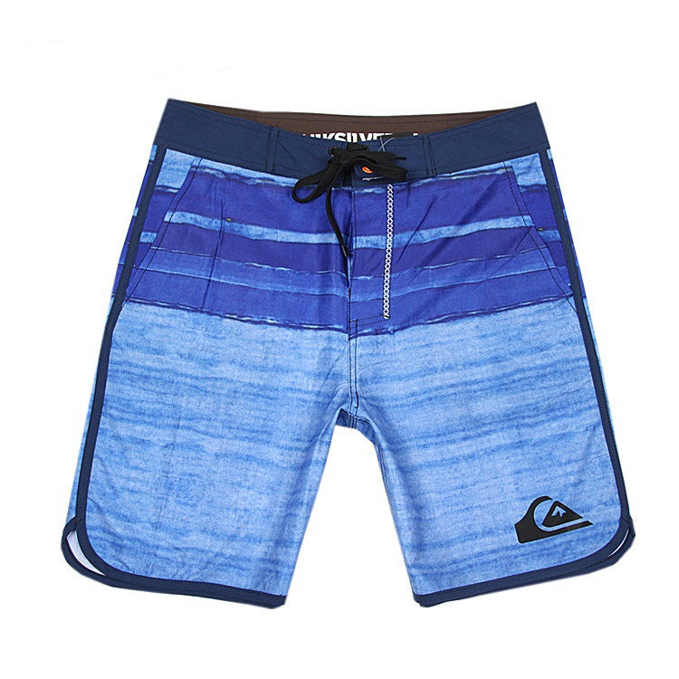 Pantalon de fitness Quiksilver pour homme, adapté au bodybuilding et compétitions, déperlant, séchage rapide, stretch, parfait pour le surf et la plage.