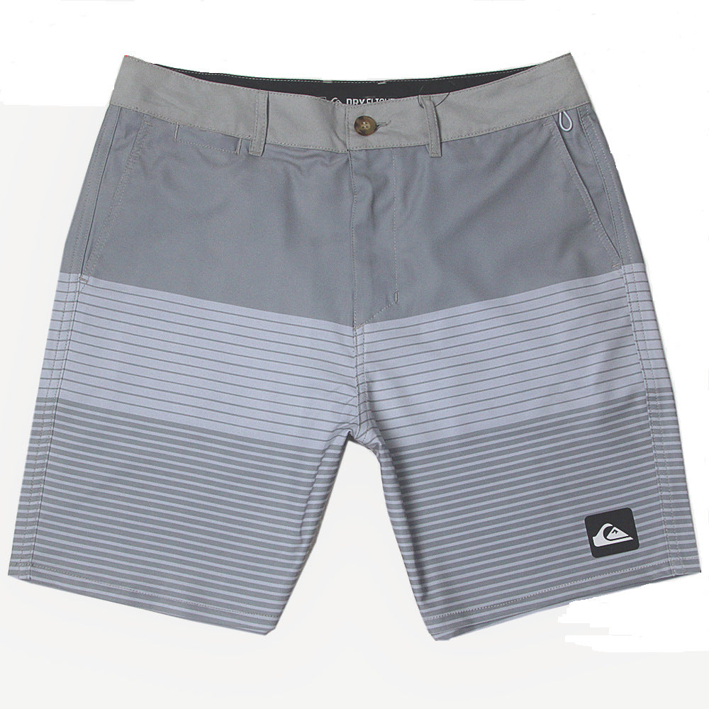 Pantalon de fitness Quiksilver pour homme, adapté au bodybuilding et compétitions, déperlant, séchage rapide, stretch, parfait pour le surf et la plage.