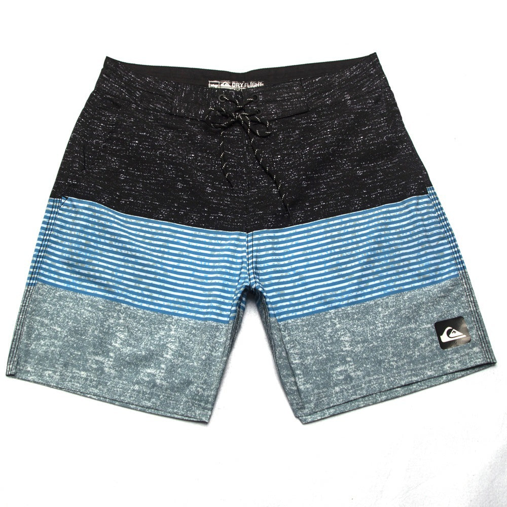 Pantalon de fitness Quiksilver pour homme, adapté au bodybuilding et compétitions, déperlant, séchage rapide, stretch, parfait pour le surf et la plage.