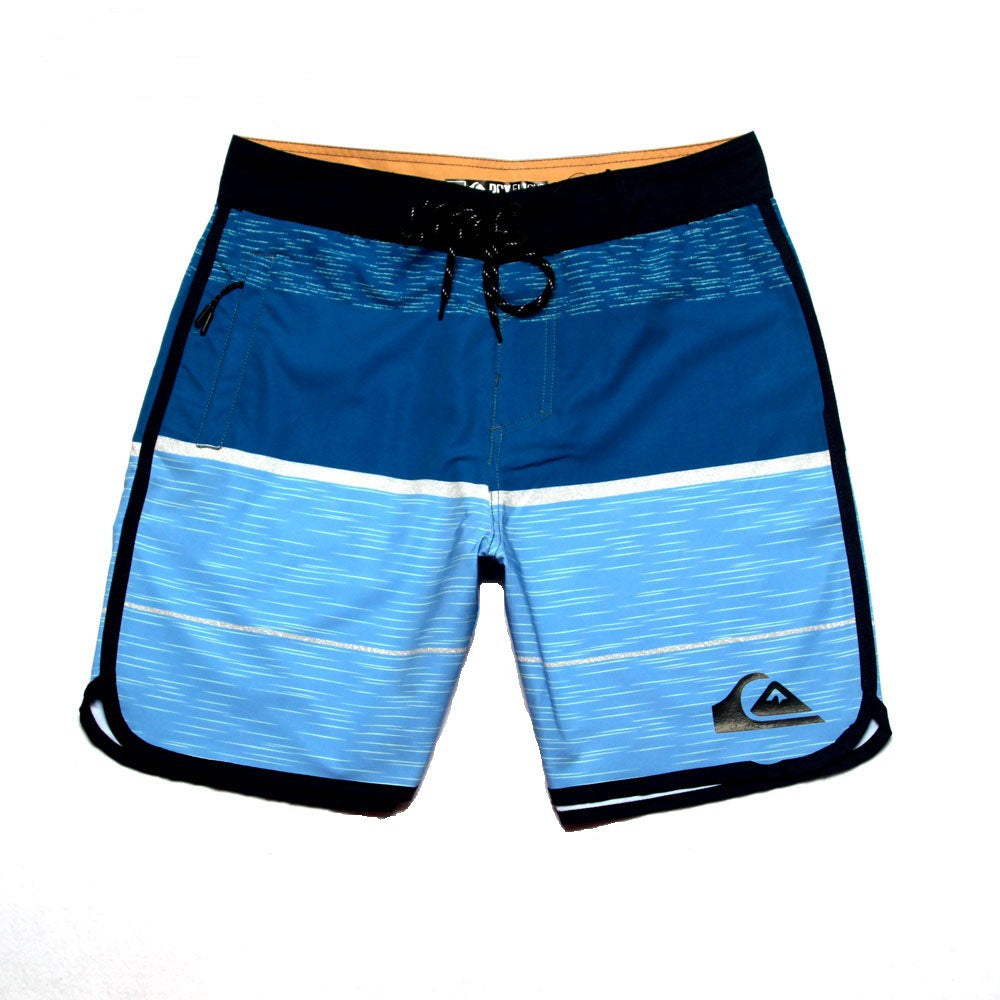 Pantalon de fitness Quiksilver pour homme, adapté au bodybuilding et compétitions, déperlant, séchage rapide, stretch, parfait pour le surf et la plage.