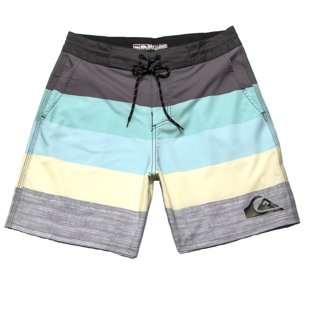 Pantalon de fitness Quiksilver pour homme, adapté au bodybuilding et compétitions, déperlant, séchage rapide, stretch, parfait pour le surf et la plage.