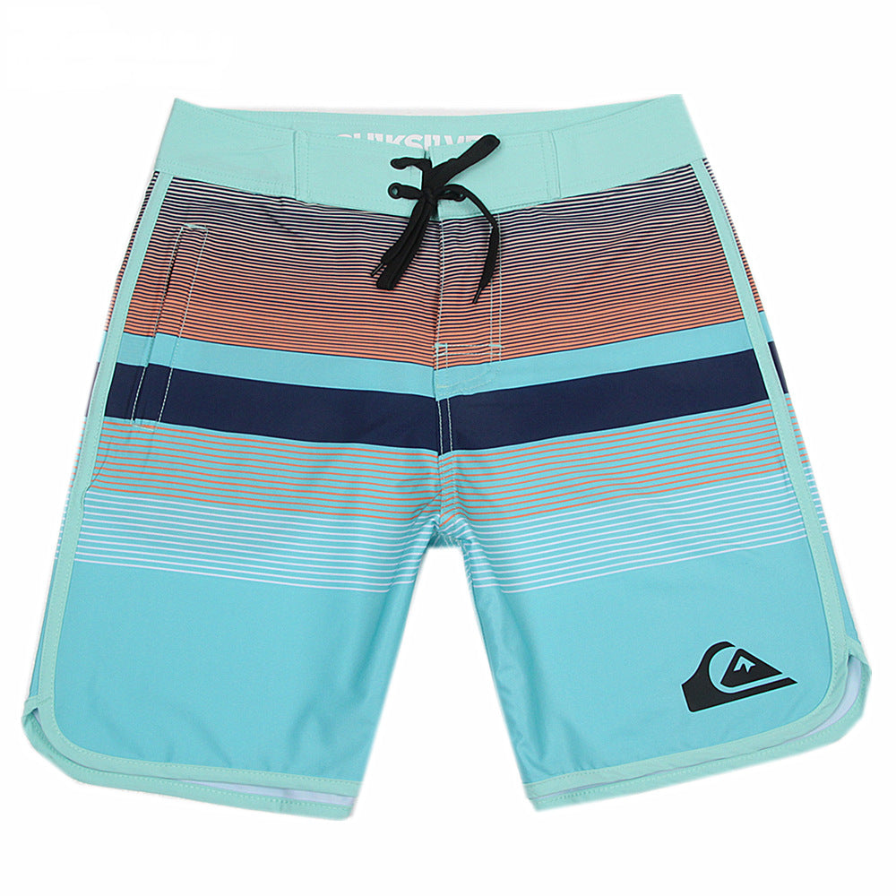 Pantalon de fitness Quiksilver pour homme, adapté au bodybuilding et compétitions, déperlant, séchage rapide, stretch, parfait pour le surf et la plage.