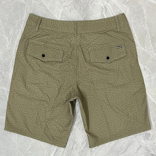 Shorts de plage pour homme Hurley, coupe courte, séchage rapide, déperlants, stretch, style décontracté pour surf et détente.