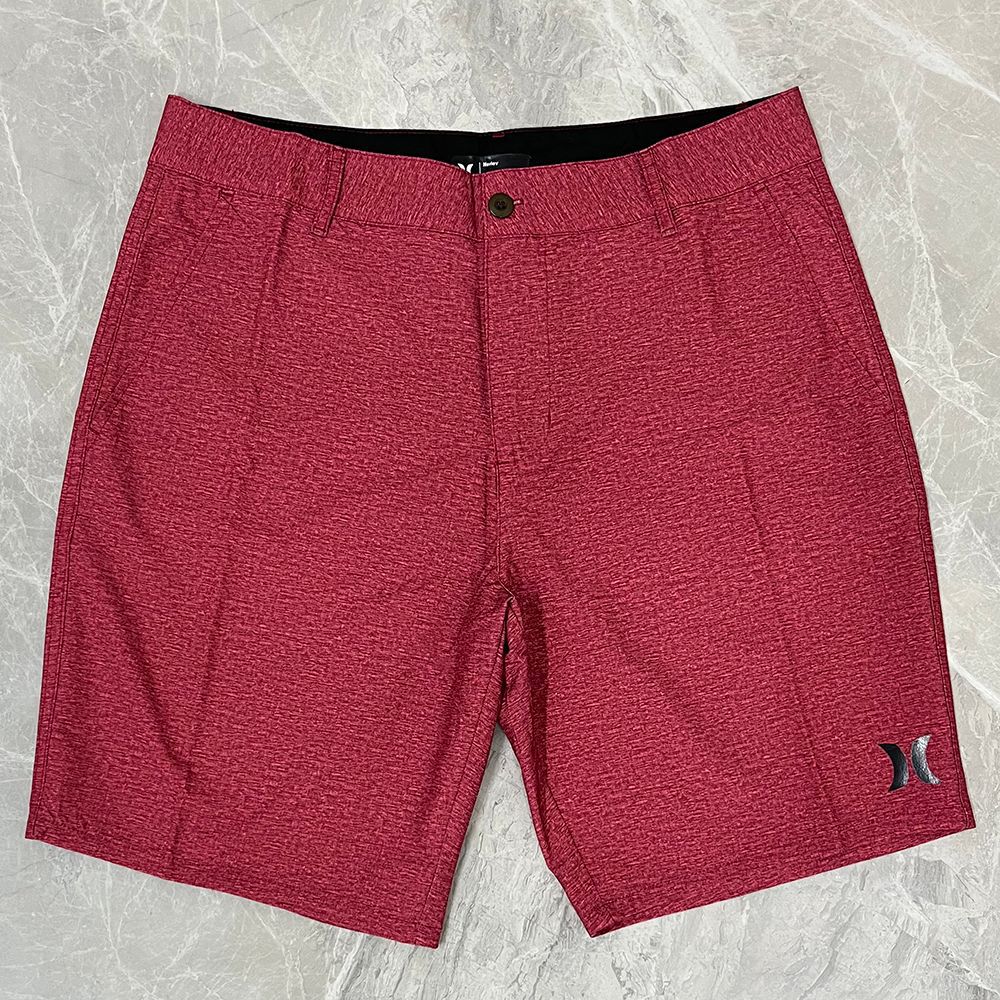 Shorts de plage pour homme Hurley, coupe courte, séchage rapide, déperlants, stretch, style décontracté pour surf et détente.
