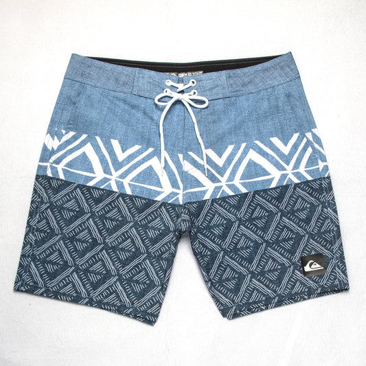 Shorts de plage Quiksilver pour homme, séchage rapide, lavable, grande taille, coupe ample et courte, style détente en station balnéaire.